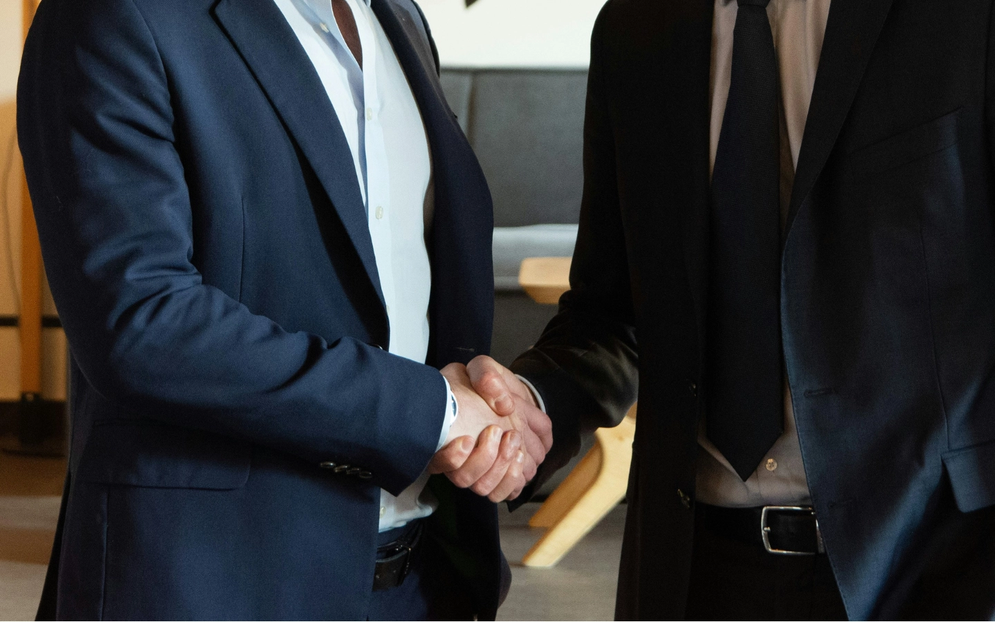 Image of person signing contract