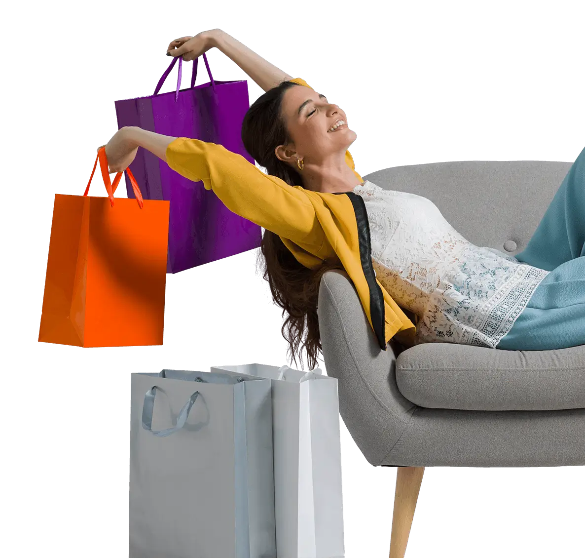 Woman resting on couch with three bags
