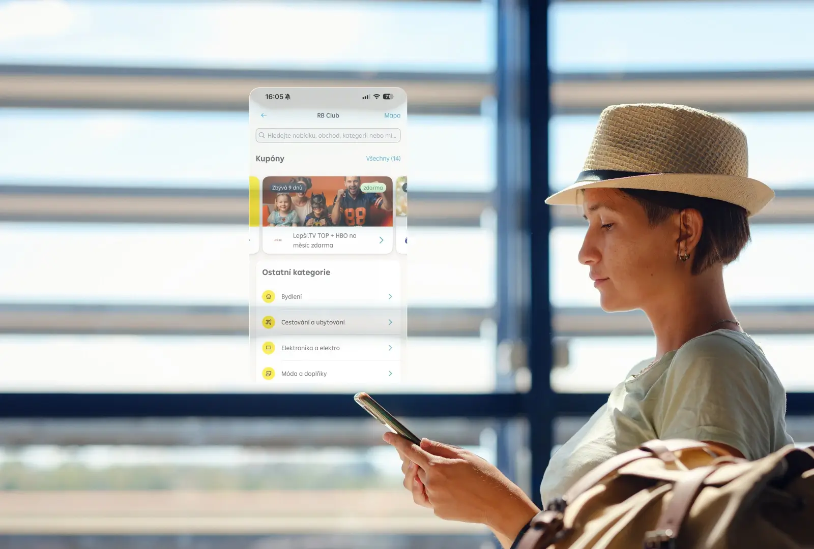Woman looking at a phone with hyper-personalised card-linked offers.