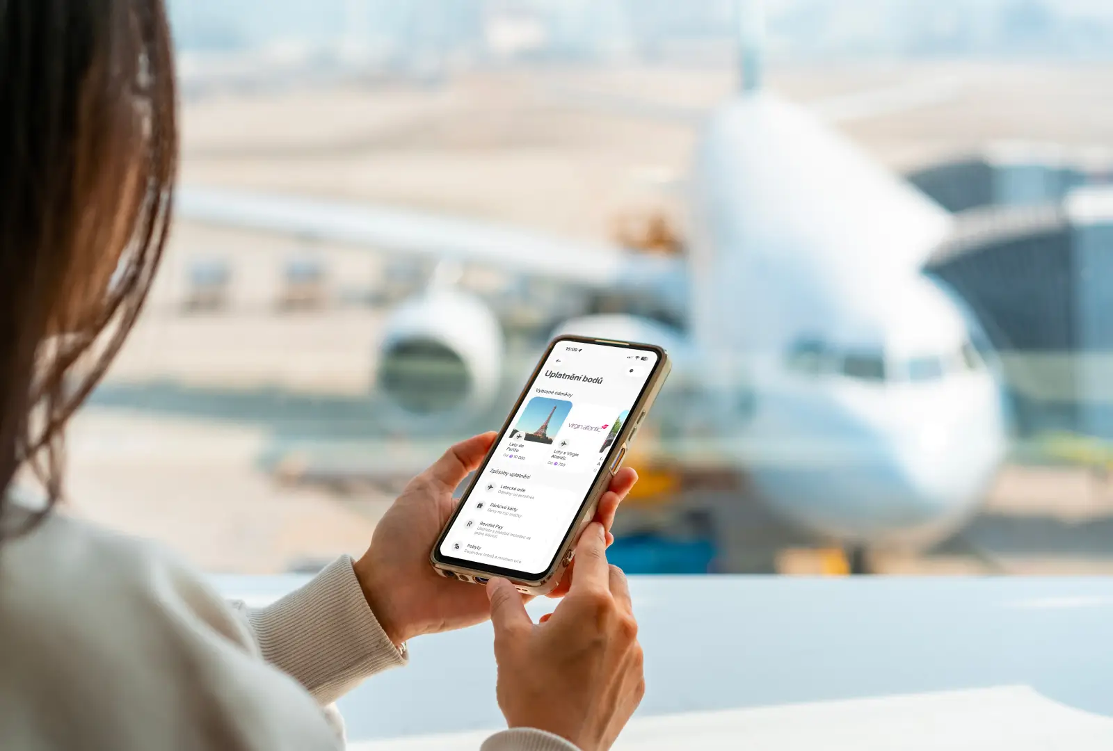 A woman looking at her phone