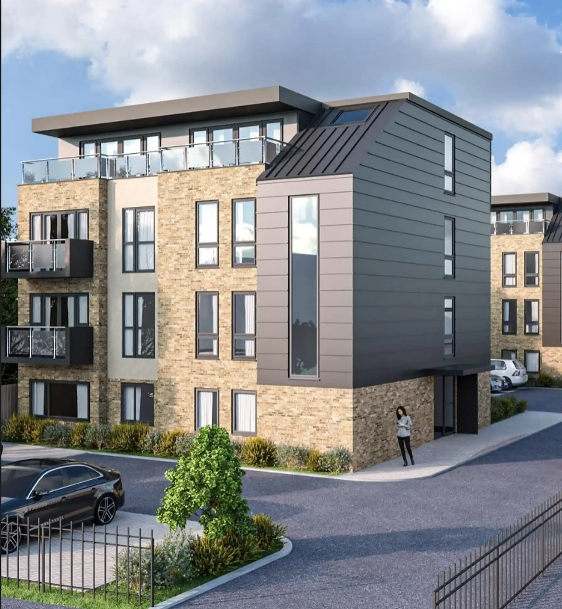 Contemporary apartment complex with brick and cladding exterior, balconies, parked cars, and a pedestrian standing near the entrance.