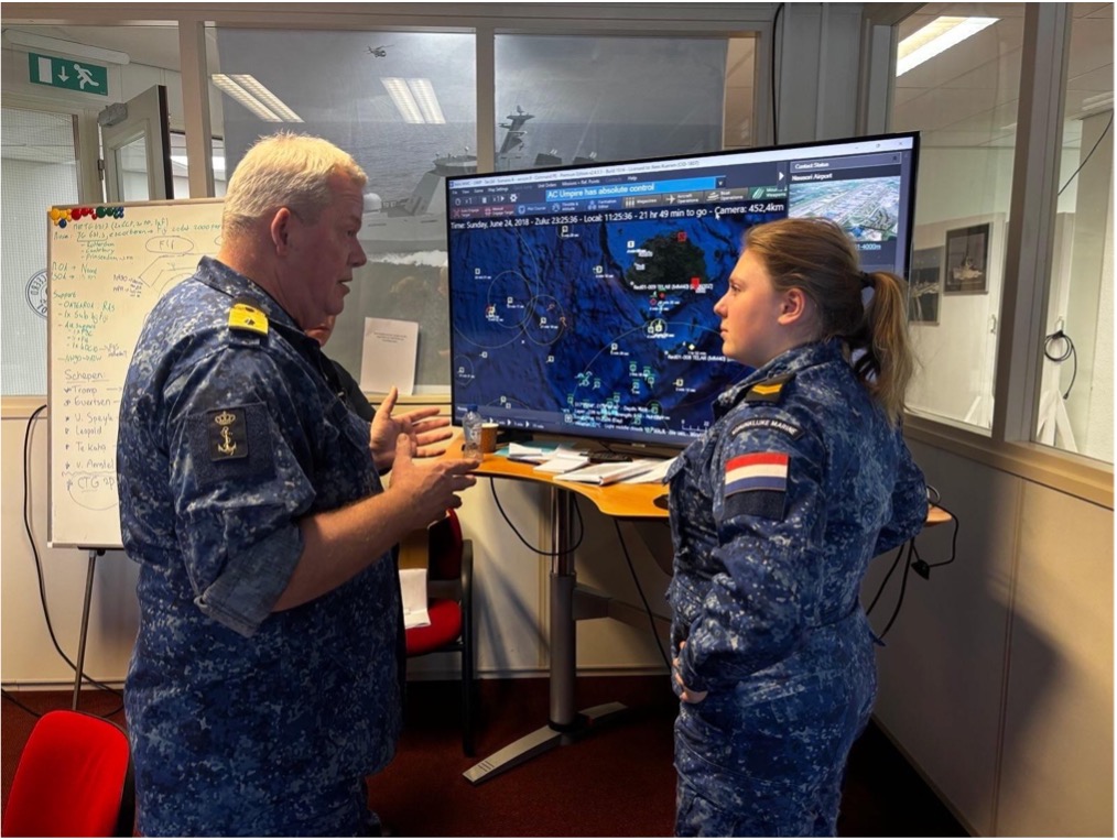 image of a business meeting (for a data analytics and business intelligence)