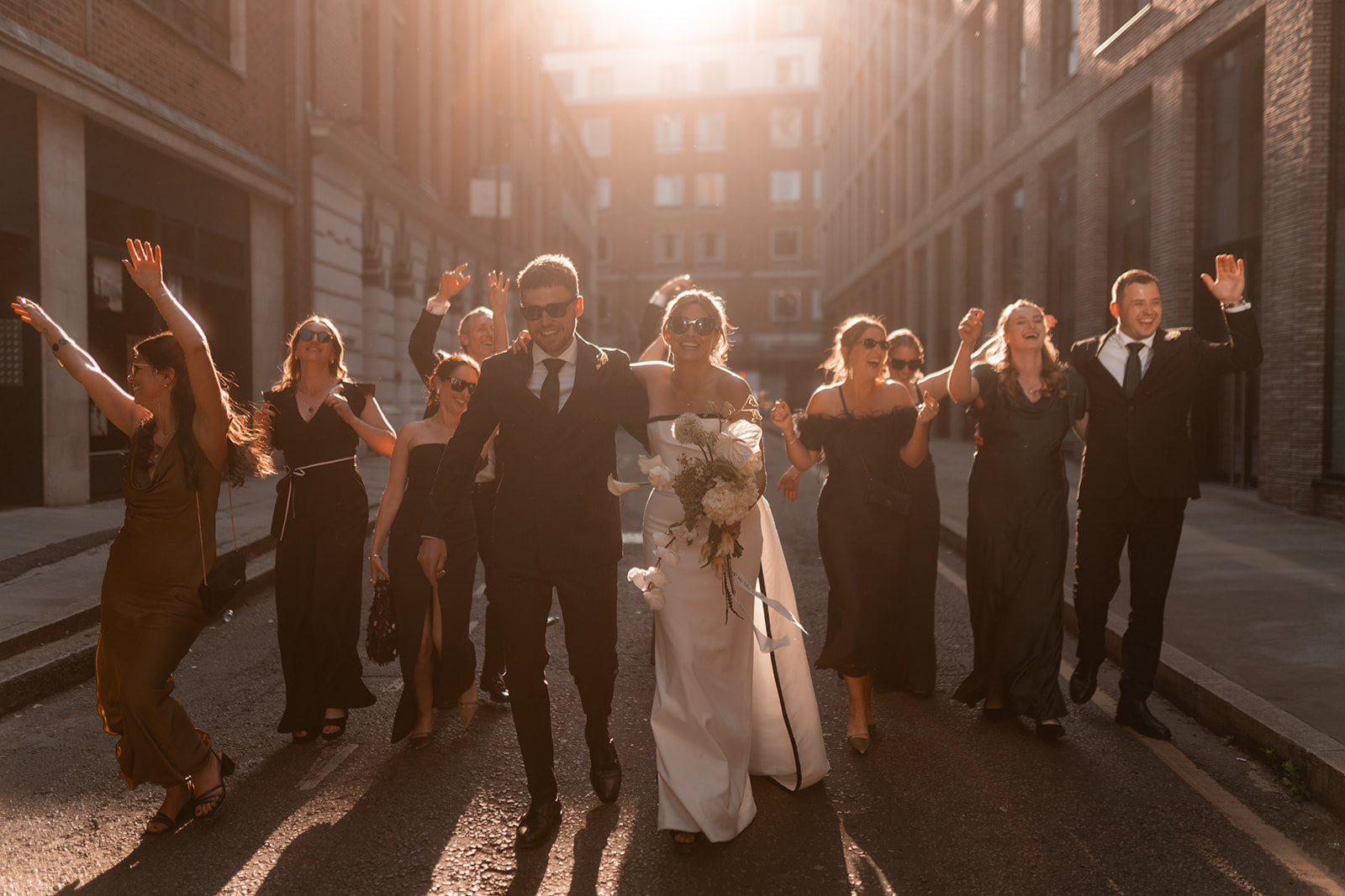 Bride and groom Natalie and Lewis arriving at their London pub wedding