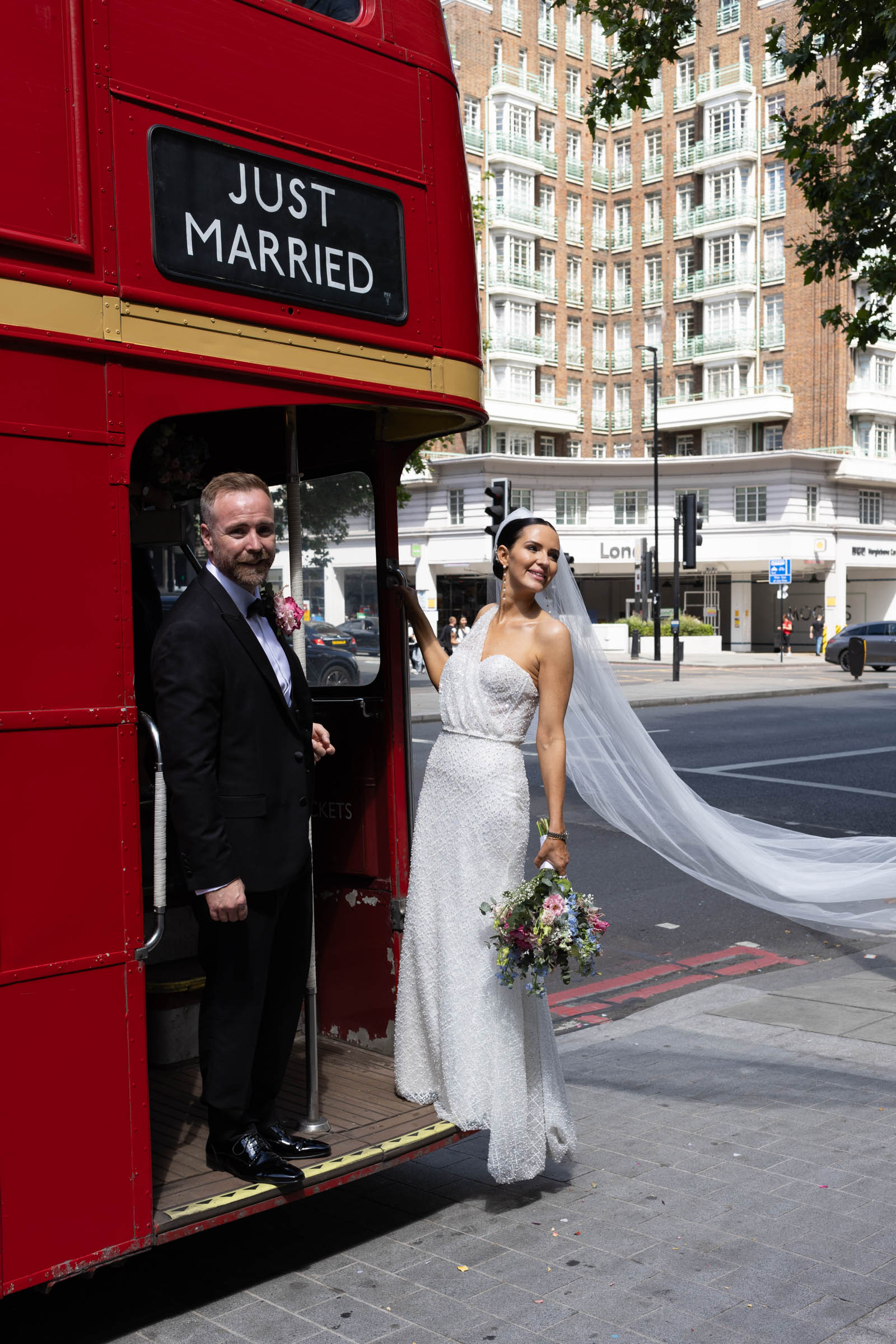 Jasmine and Dean celebrating their relaxed city wedding in London
