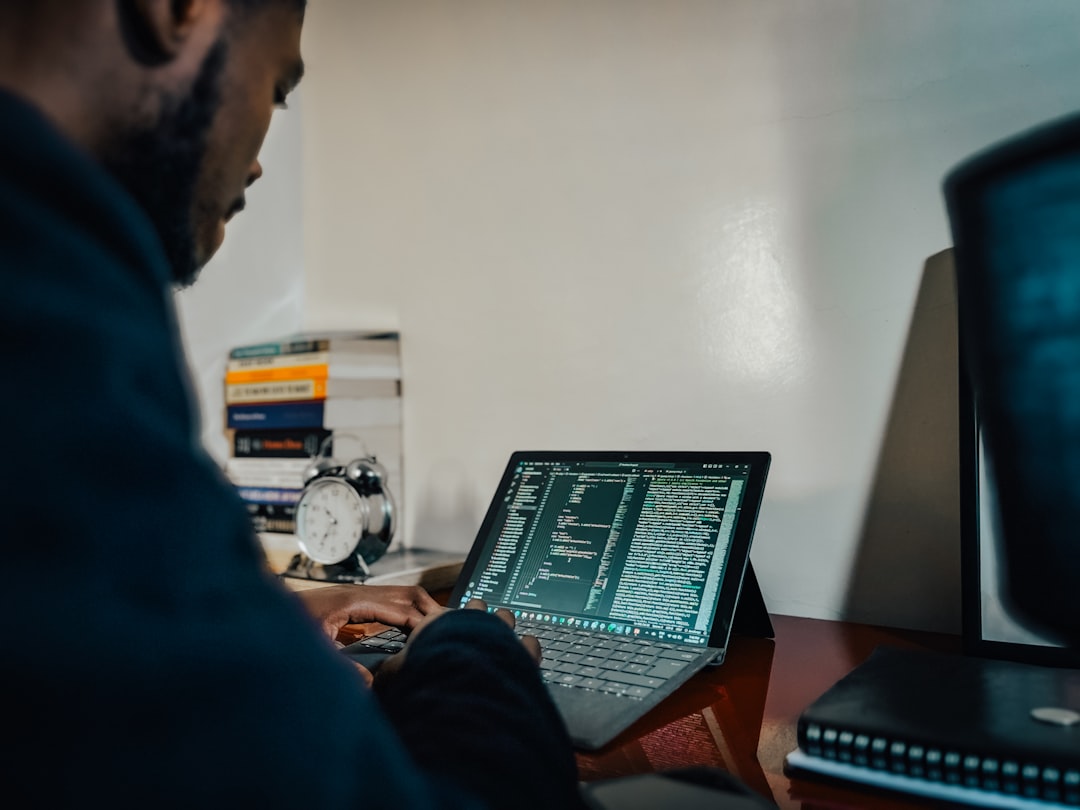 A person reviewing a portfolio on a computer screen - branding and web design agency