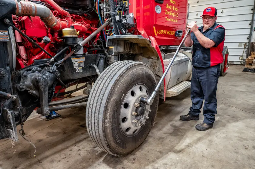 Diesel mechanic performing truck driveline repair in Coldwater, MI
