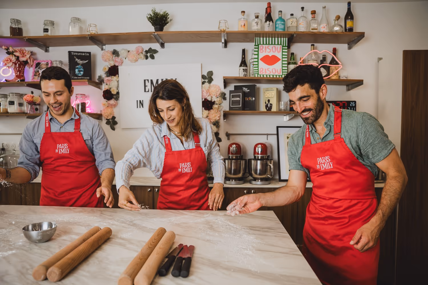 Croissant making three guests spreading flour