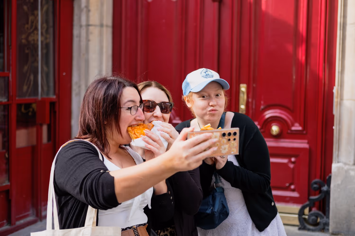 Walking Tour guests holding pastry like emily in paris