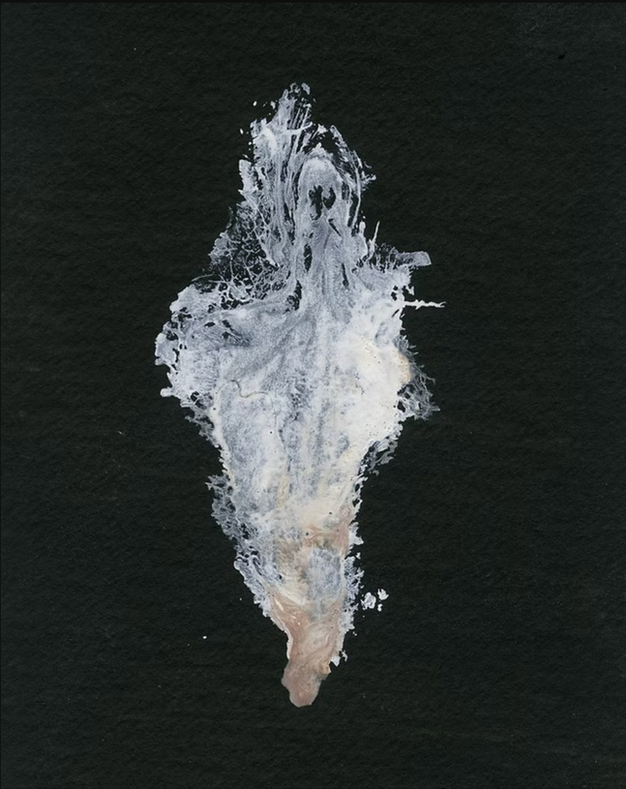 White yoni artwork on black textured paper. The print is tan at the bottom and white everywhere else.