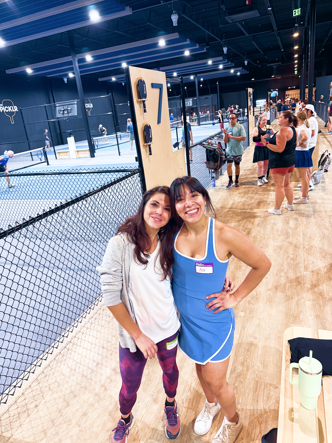 two pickleball players enjoying the party