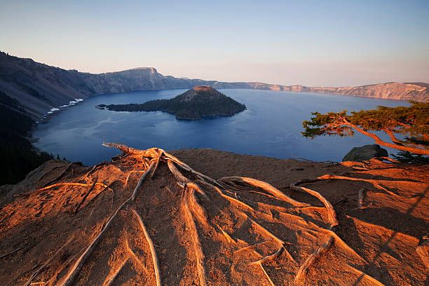 crater lake sunset - crater lake oregon stock pictures, royalty-free photos & images