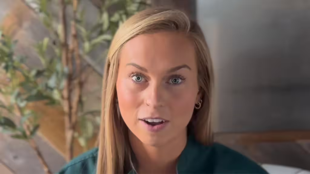Dr. Mikala Booher,  speaks directly to the camera in a close-up shot.