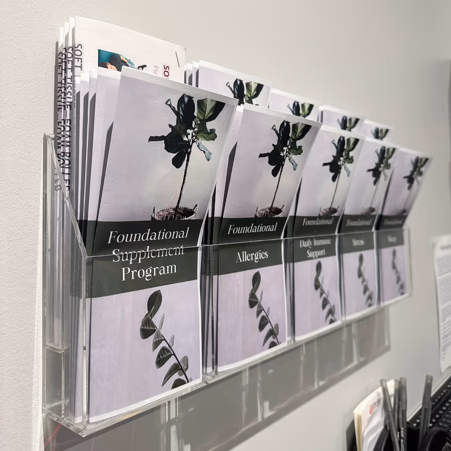 A display of pamphlets for a foundation supplement program.