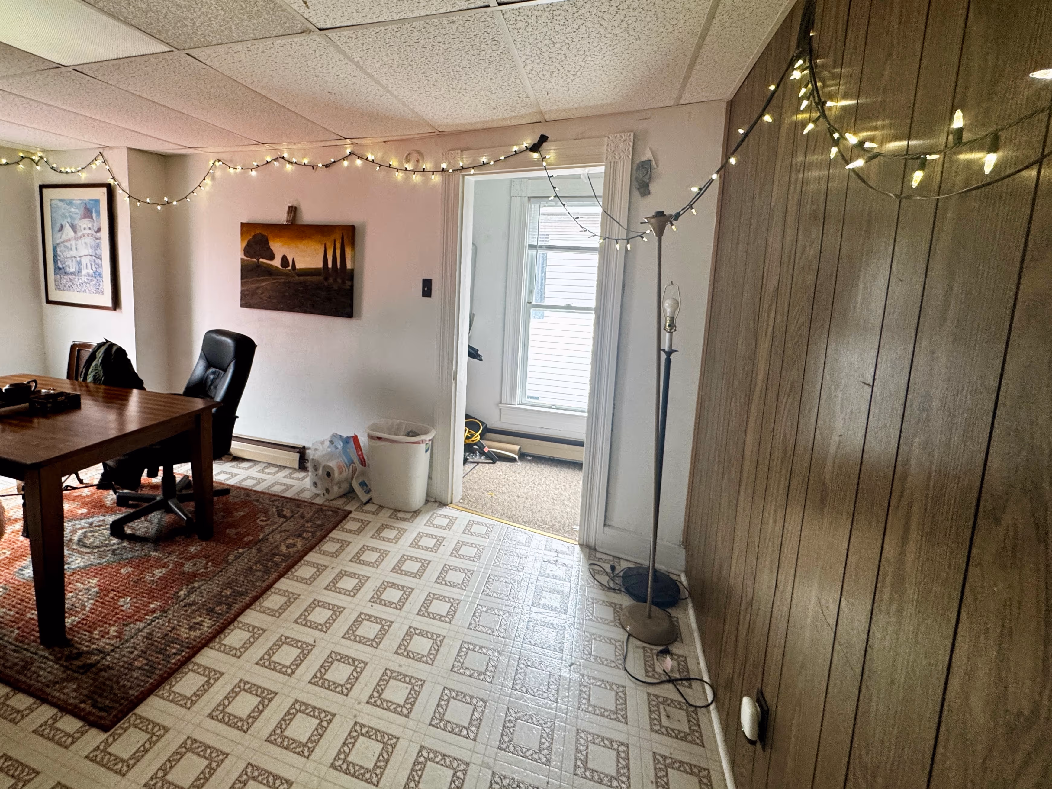 Compact Frostburg apartment with soft lighting and simple furnishings.