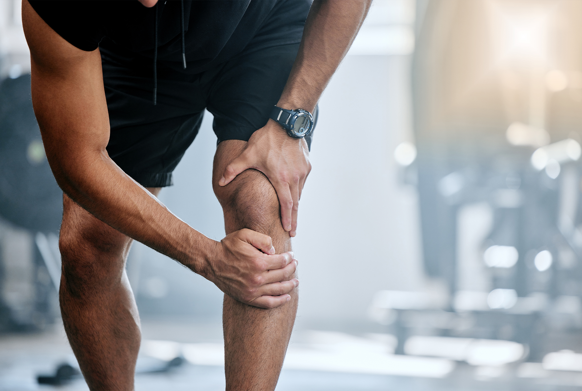 A man with a hurt knee