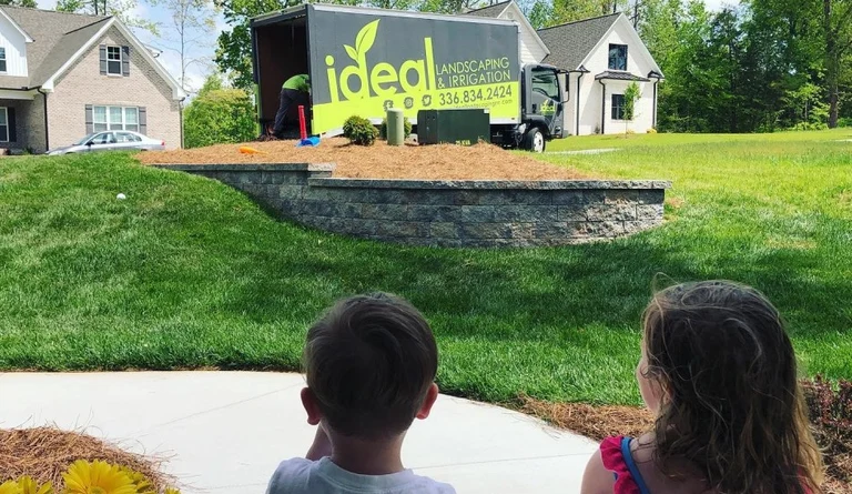 ideal branding image with kids watching ideal truck