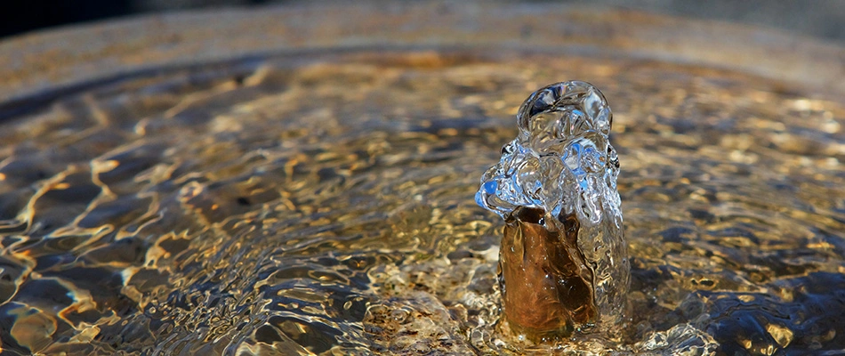 Bubbler water feature installed for landscaping in Jamestown, NC.