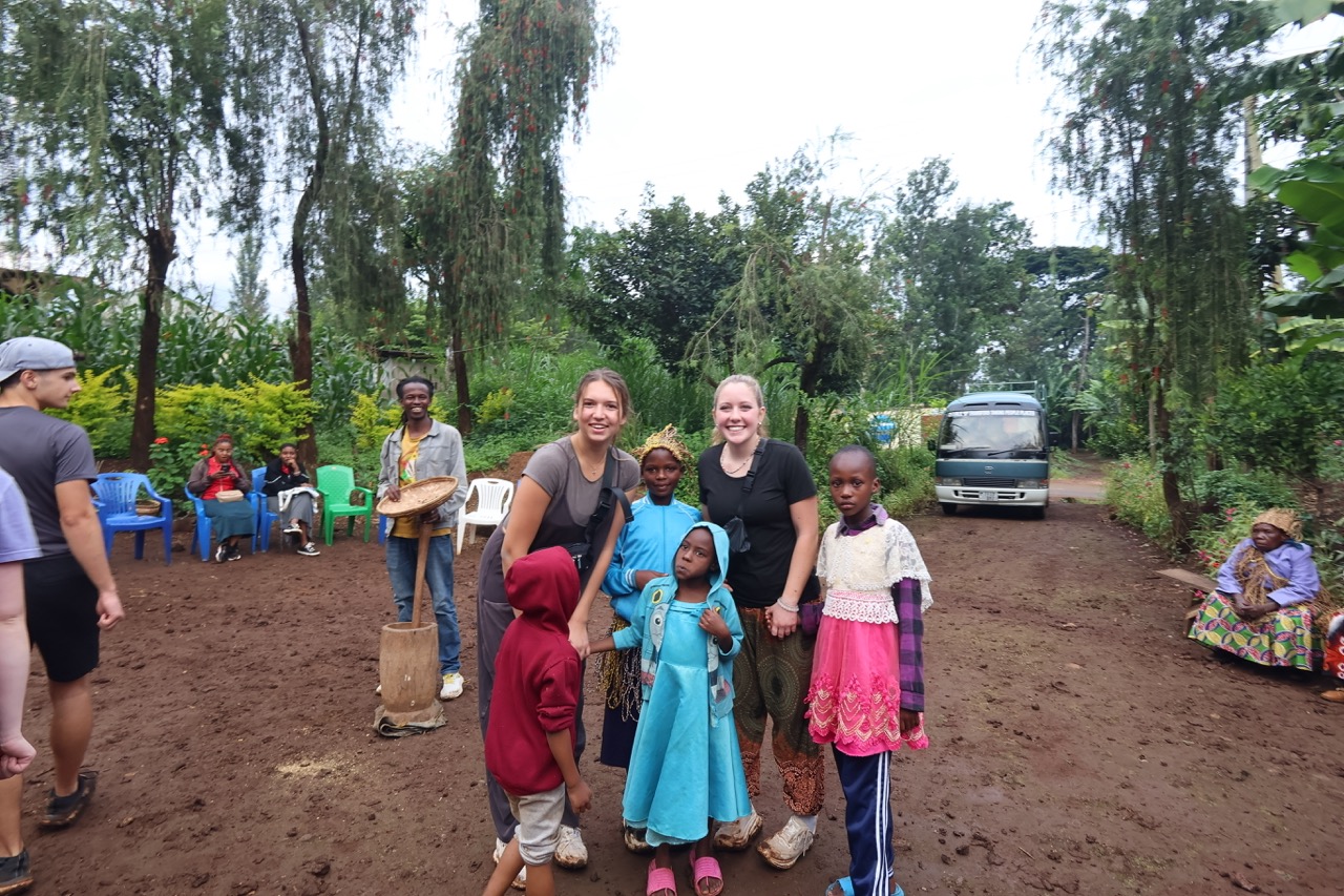 image of volunteer teaching children