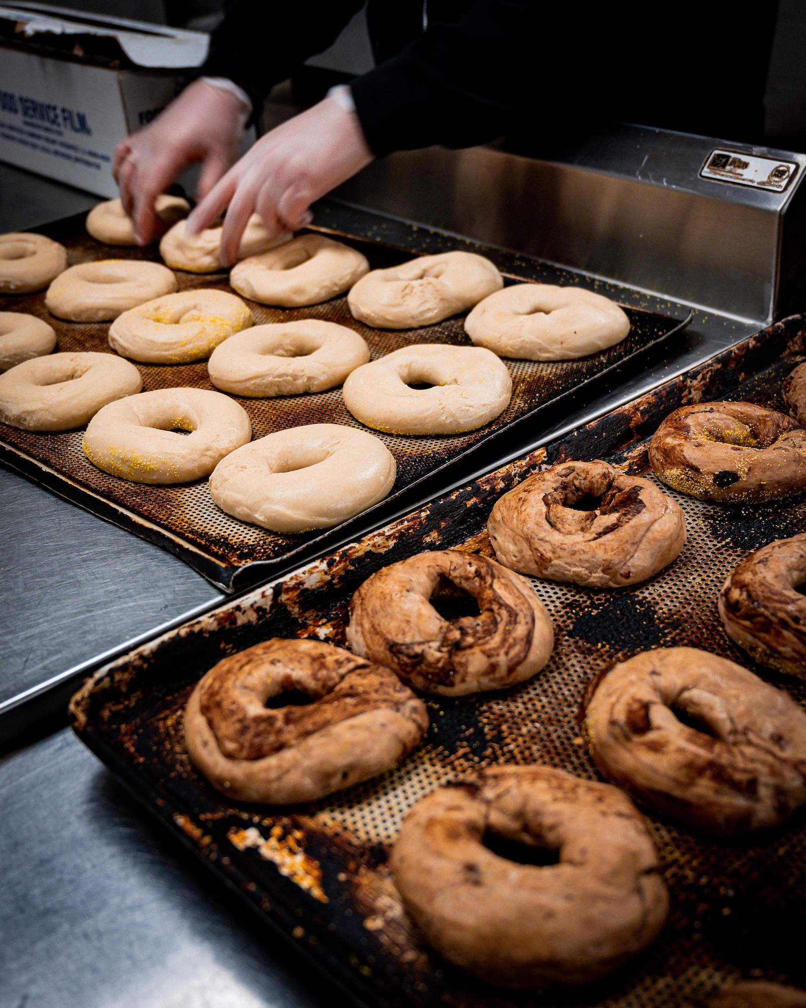 Staff prepping bagels