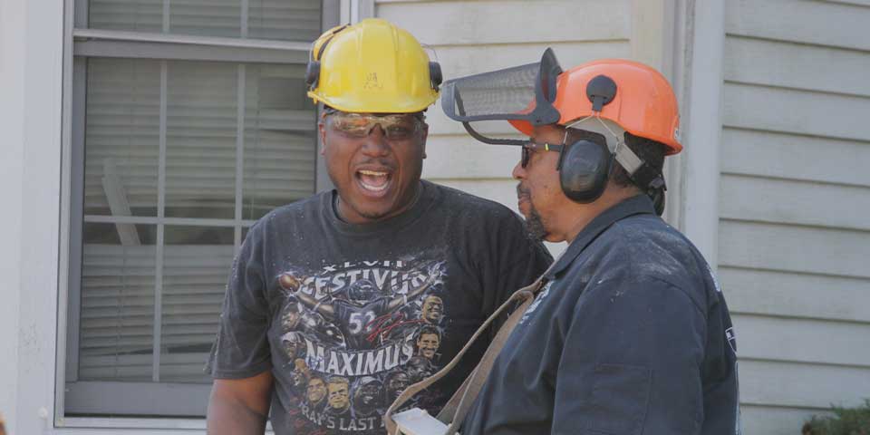 Sam Crowder speaking to a crew member