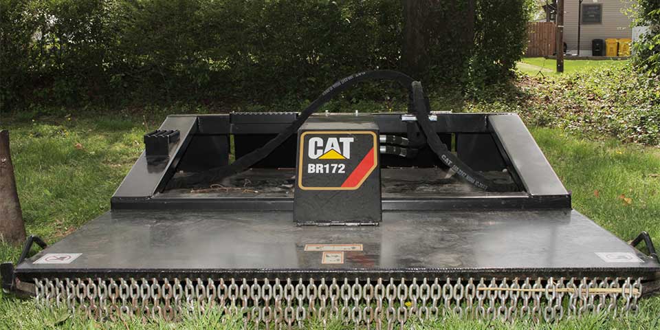 A bush hog bobcat attachment