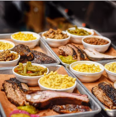 A selection of various foods arranged on trays, showcasing an assortment of colors and textures.