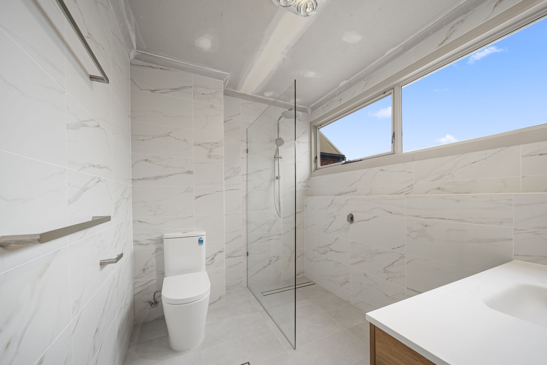 Carrington St, Adelaide, bathroom with walk-in shower and marble-look tiles