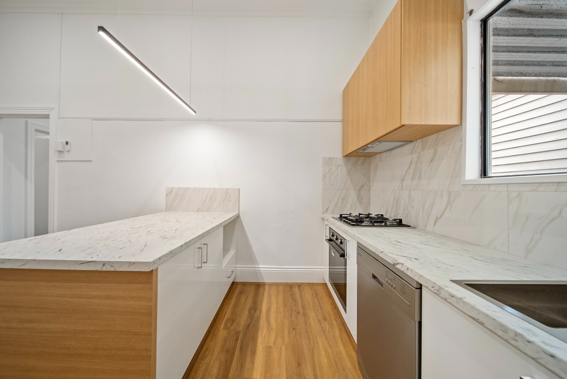 Tap St, Rosewater, renovated kitchen with timber-front island