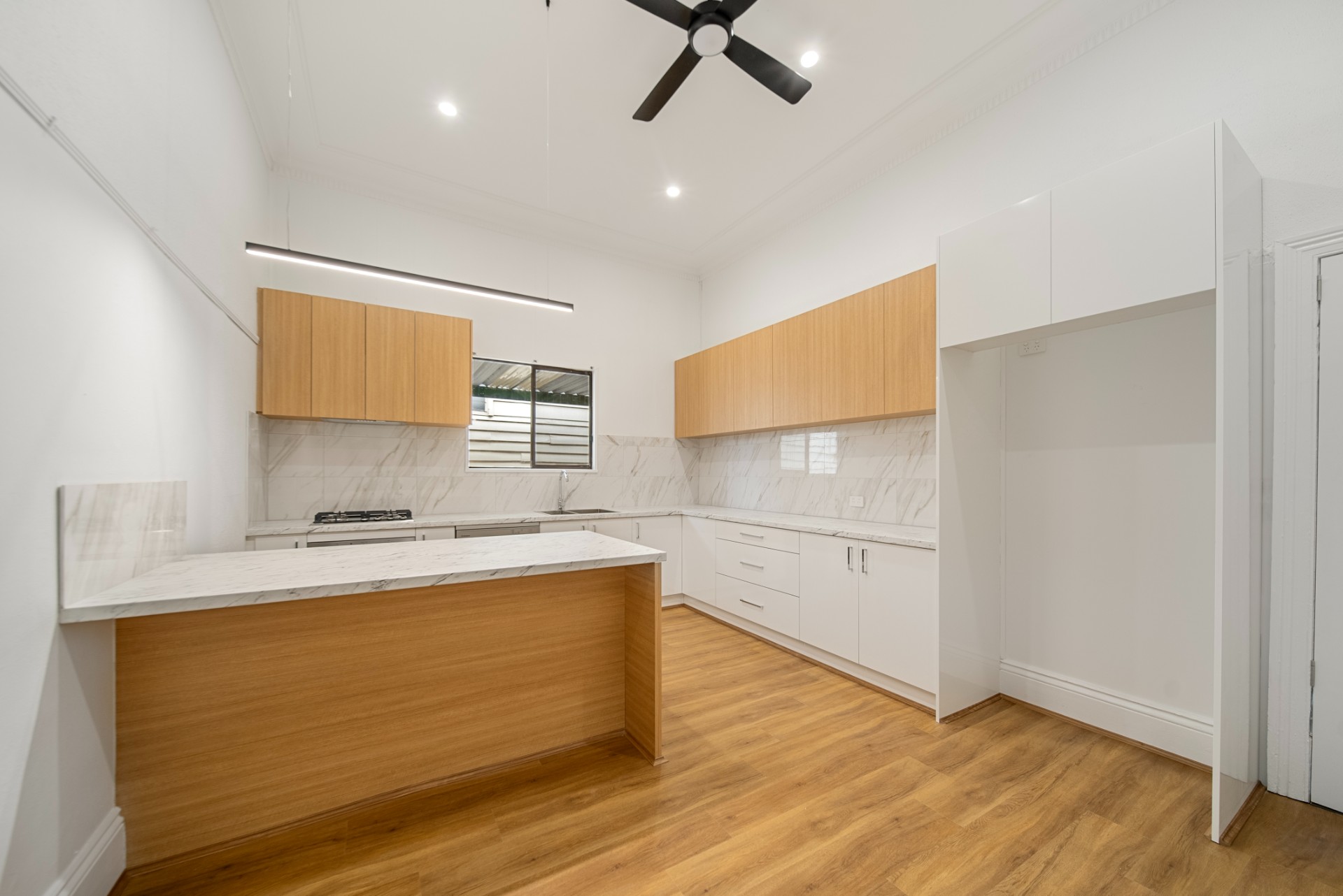 Tap St, Rosewater, kitchen with timber island and white cabinetry