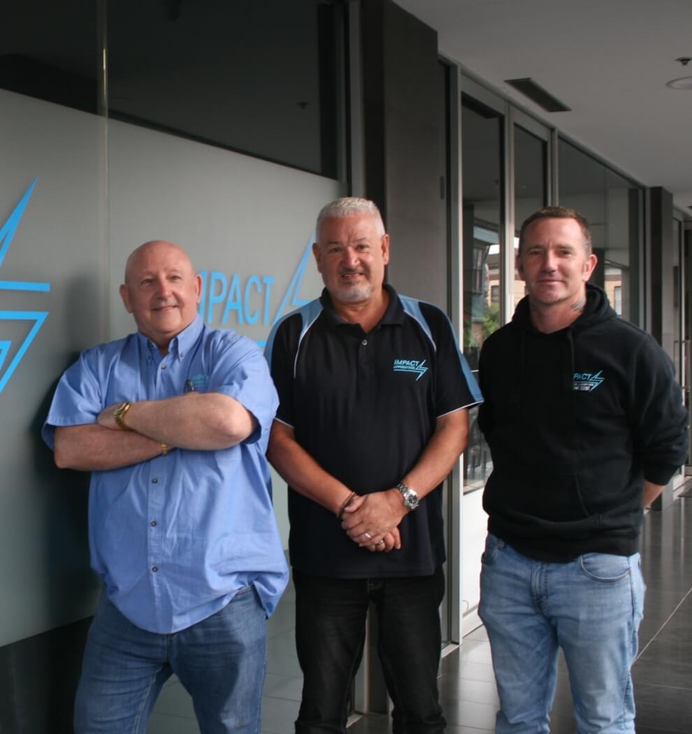 Stephen McKay, Ian Theobald and Ryan McKay standing outside Impact Apprentices' Collingwood officer