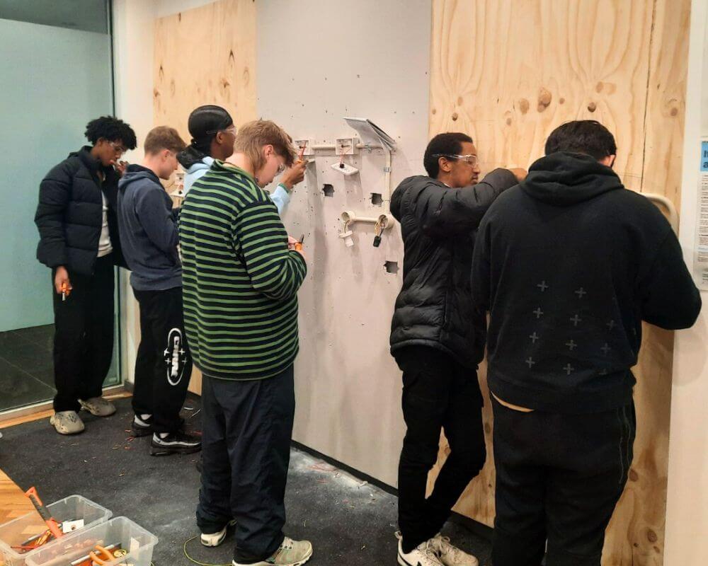 Beginner level apprentice training with electrical cables and circuits at Impact Apprentices Skill and Development Centre in Collingwood