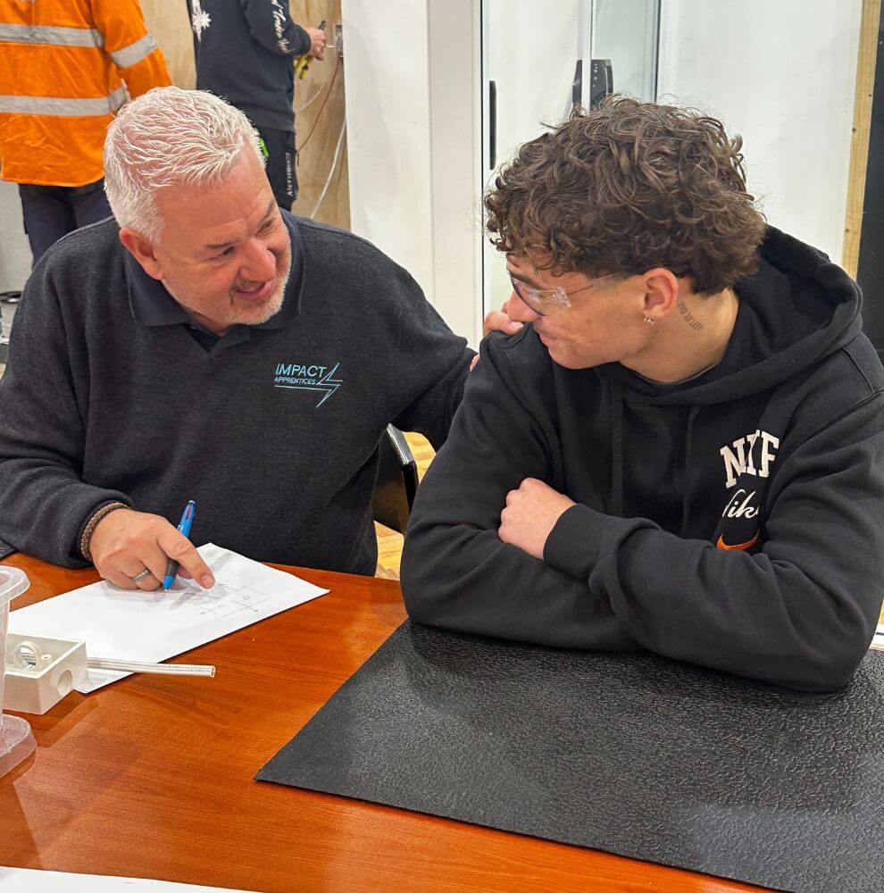 Ian Theobald with one of the students from the Skills and Development Centre