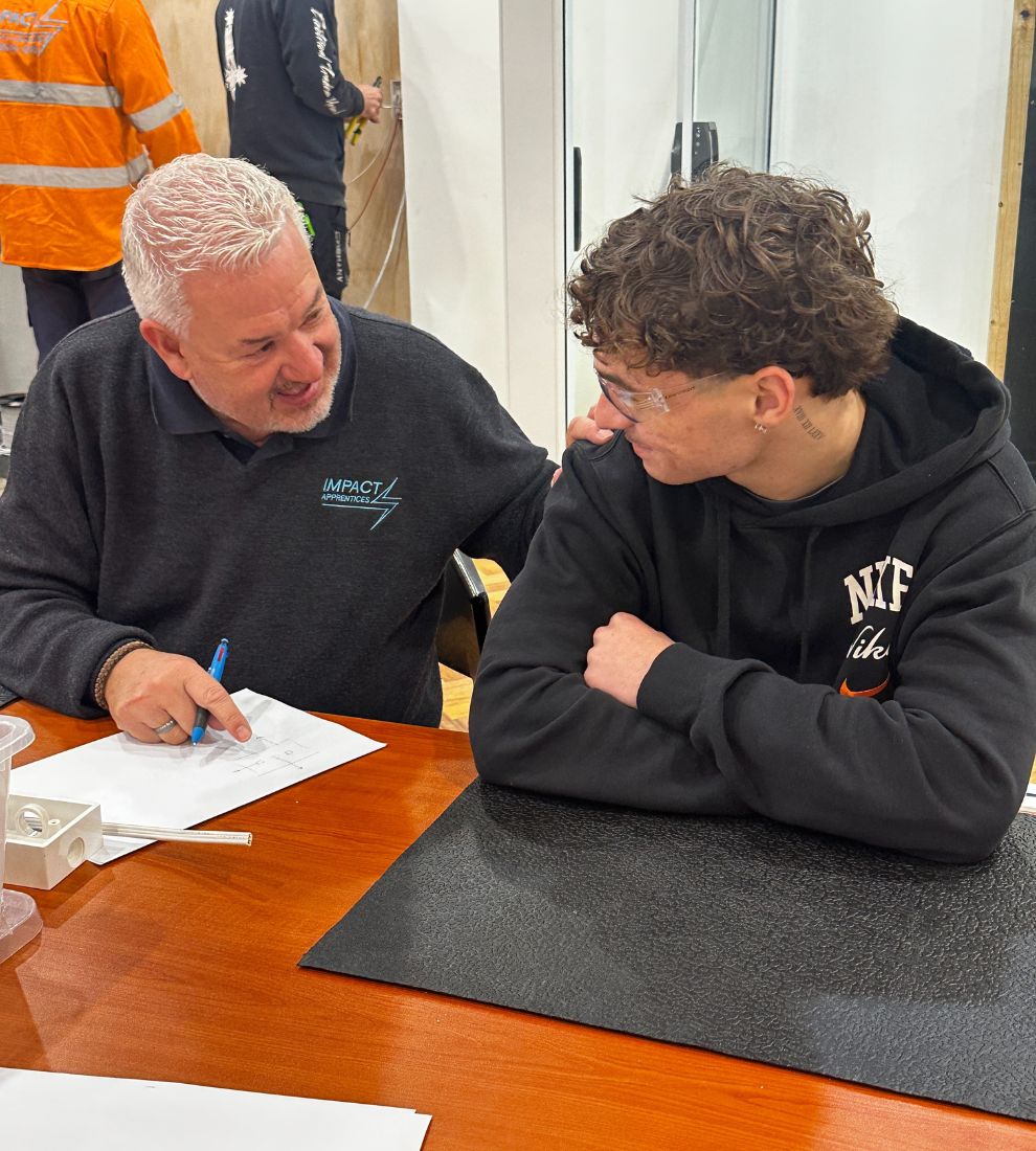 Ian, the instructor with one of our apprentices 