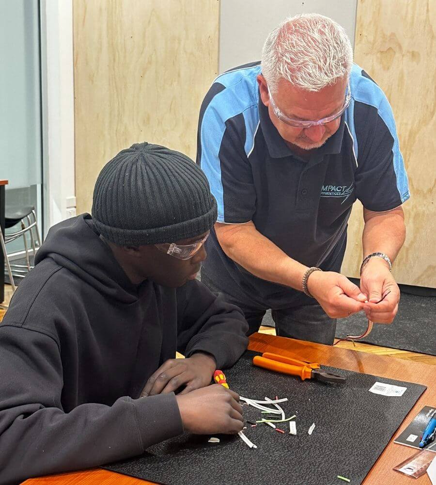 Ian, Skill Centre teacher, working with a student in the Skill Centre