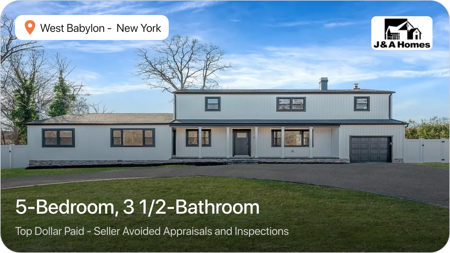 An image of a Modern farmhouse style house with gray trim in West Babylon, NY, sold by J&A Homes