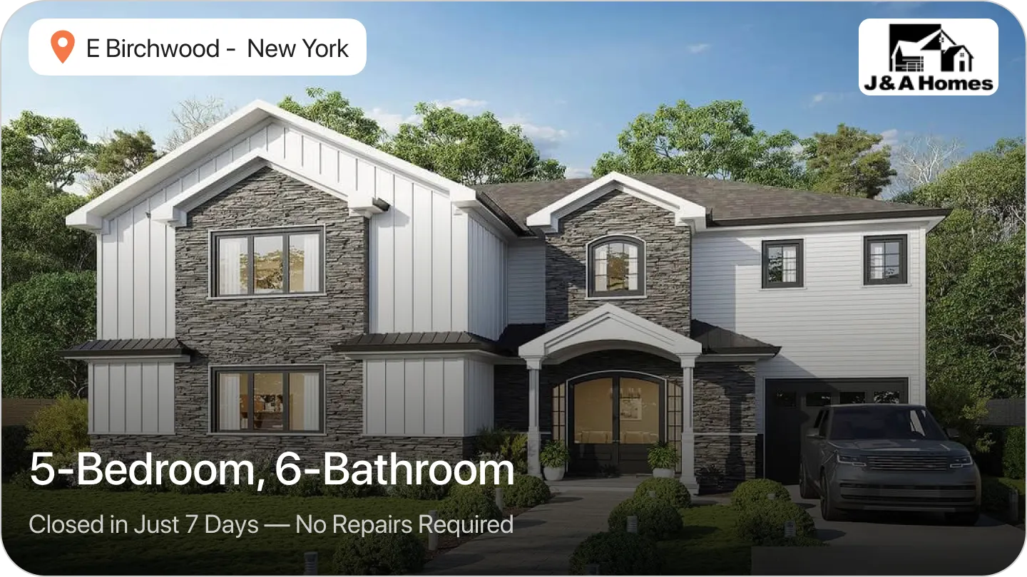 An Image of a Large modern house with stone and white siding in E Birchwood, NY, sold by J&A Homes
