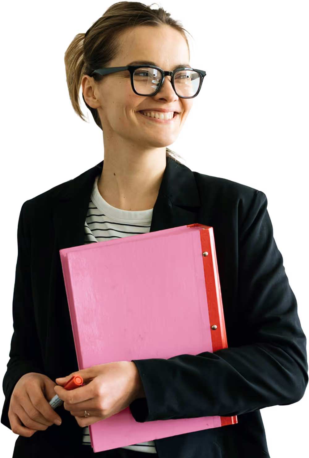 Smiling professional woman holding a pink binder and red pen, wearing glasses and a dark blazer