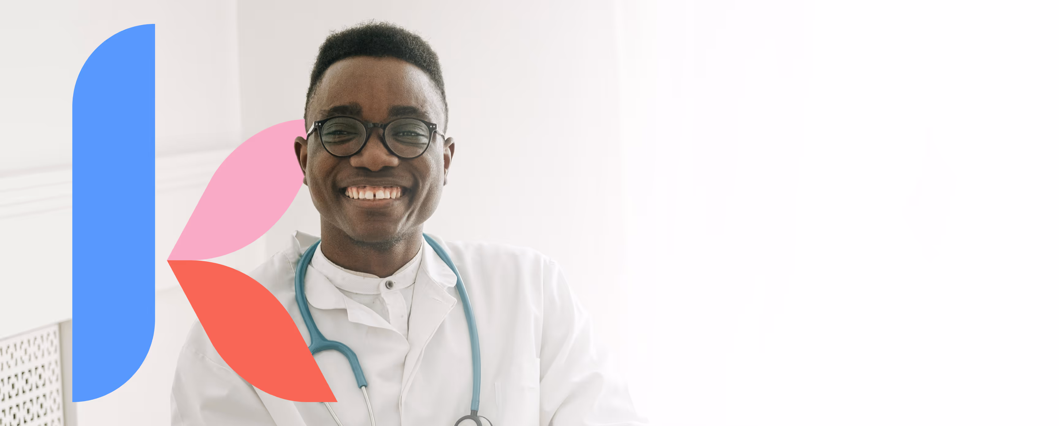 Smiling doctor wearing glasses and a white coat with a teal stethoscope around his neck, standing in a bright room.