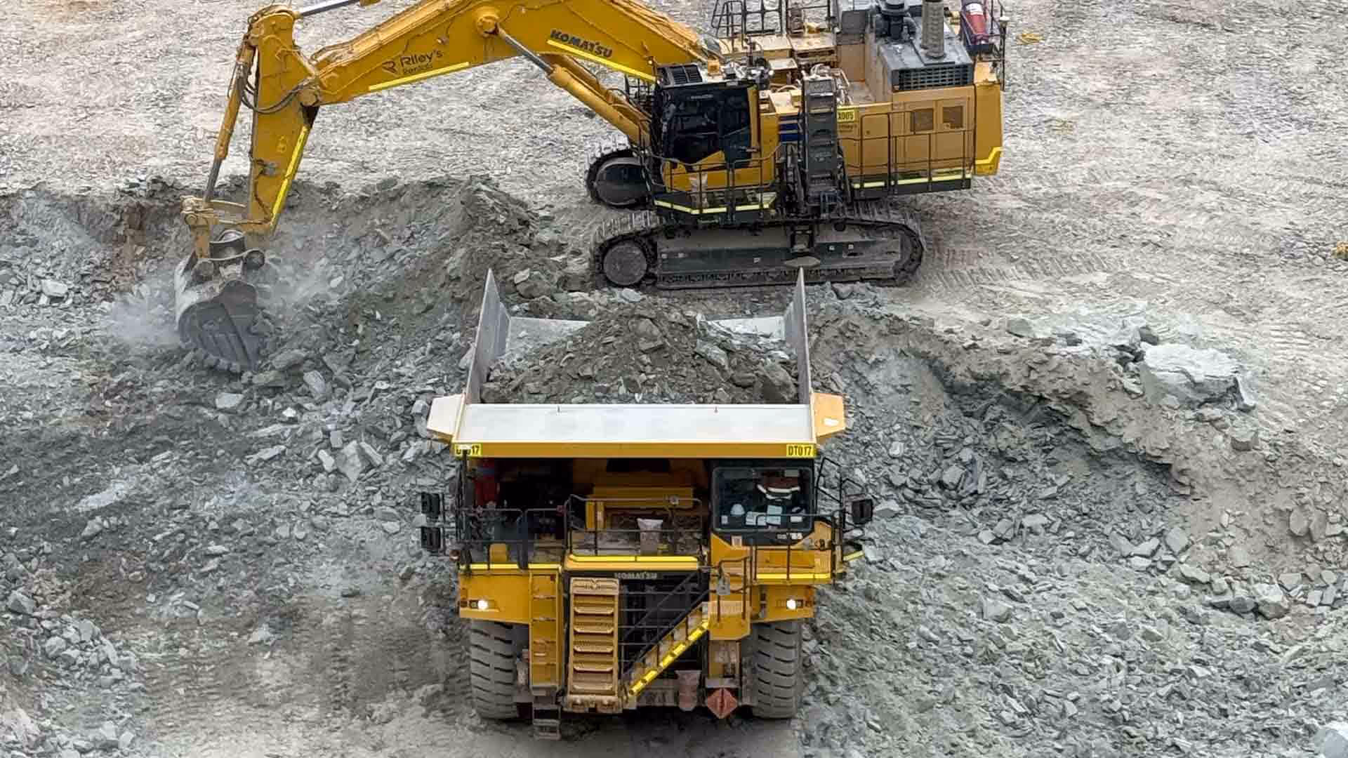 large mining equipment at work at a gold mine project