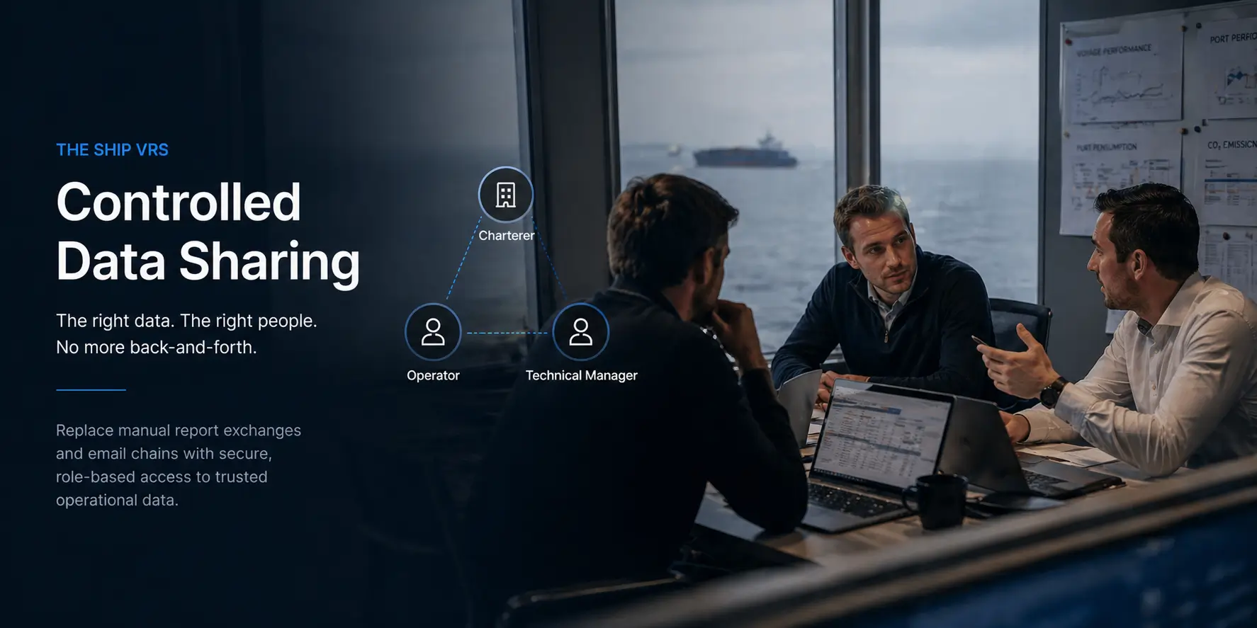 hree people sitting and discussing at a desk.