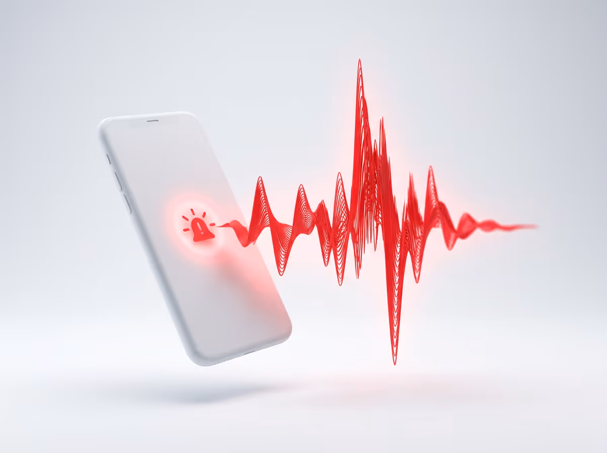 White smartphone with a red alert icon emitting a red sound wave signal.