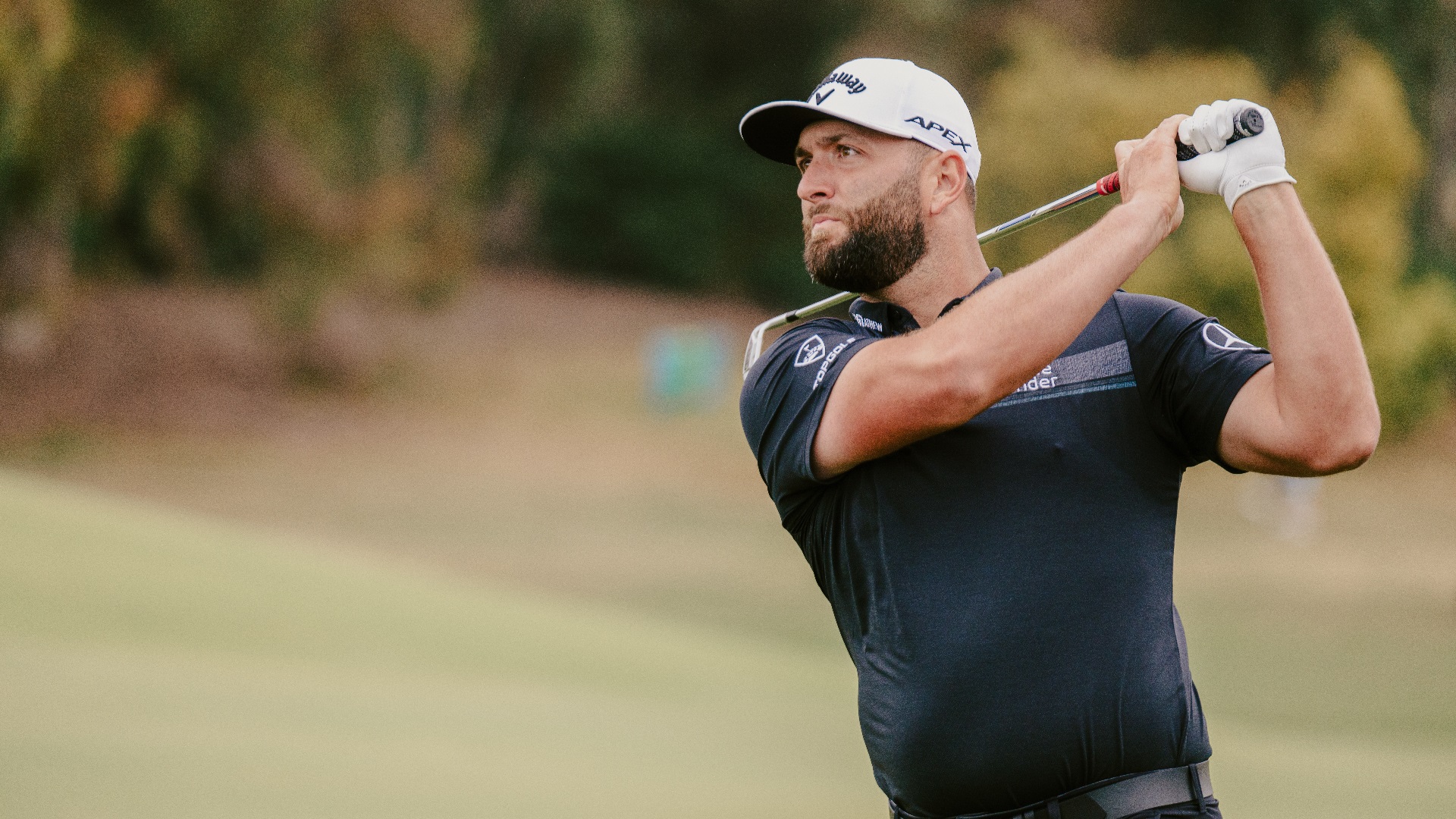 Jon Rahm holds a finishing position.