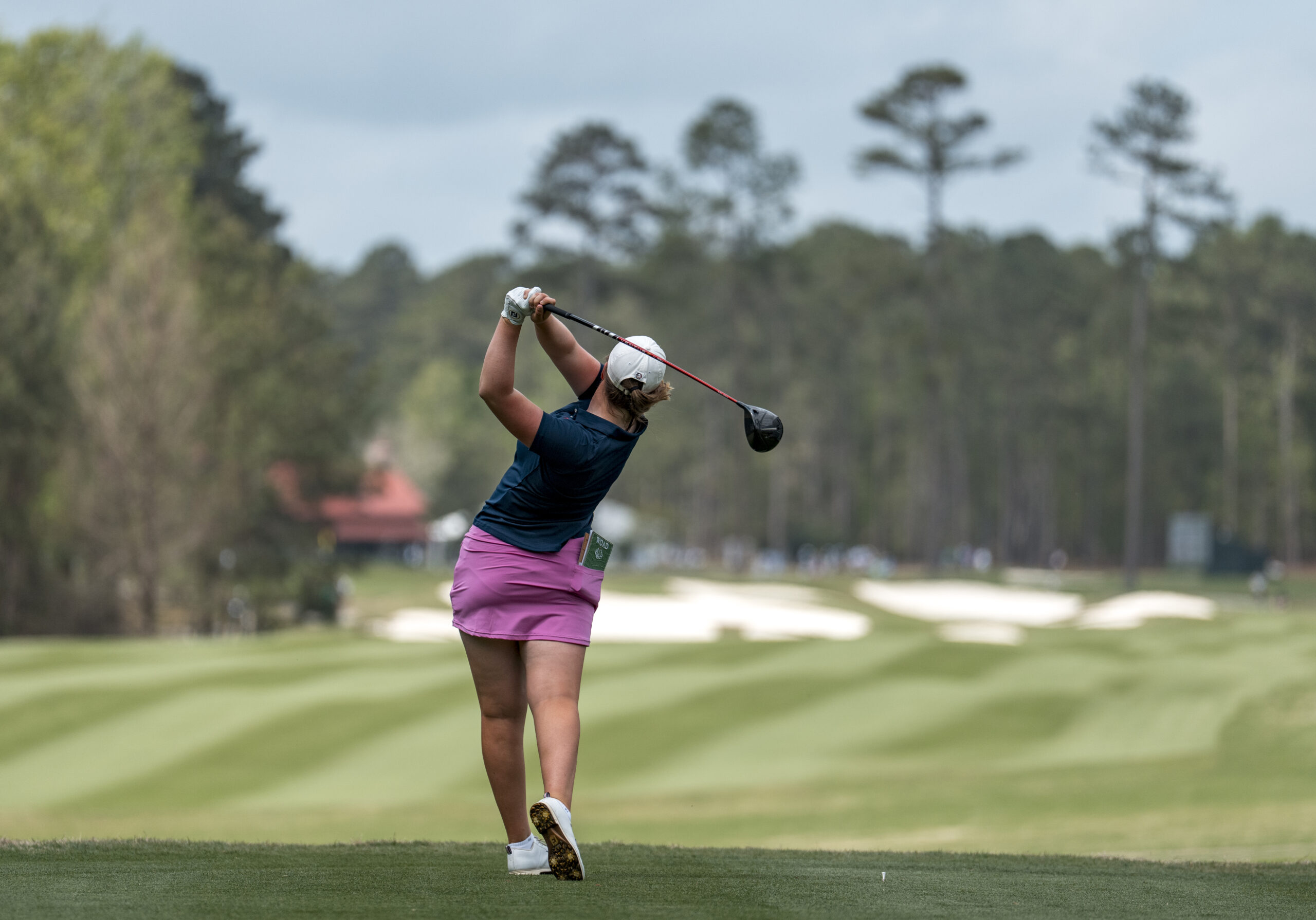 Augusta National Women’s Amateur Champion Lottie Woad of England plays her stroke from the No. 18 tee during the second round of the Augusta National Women's Amateur at Champions Retreat Golf Club, Thursday, April 03, 2025.