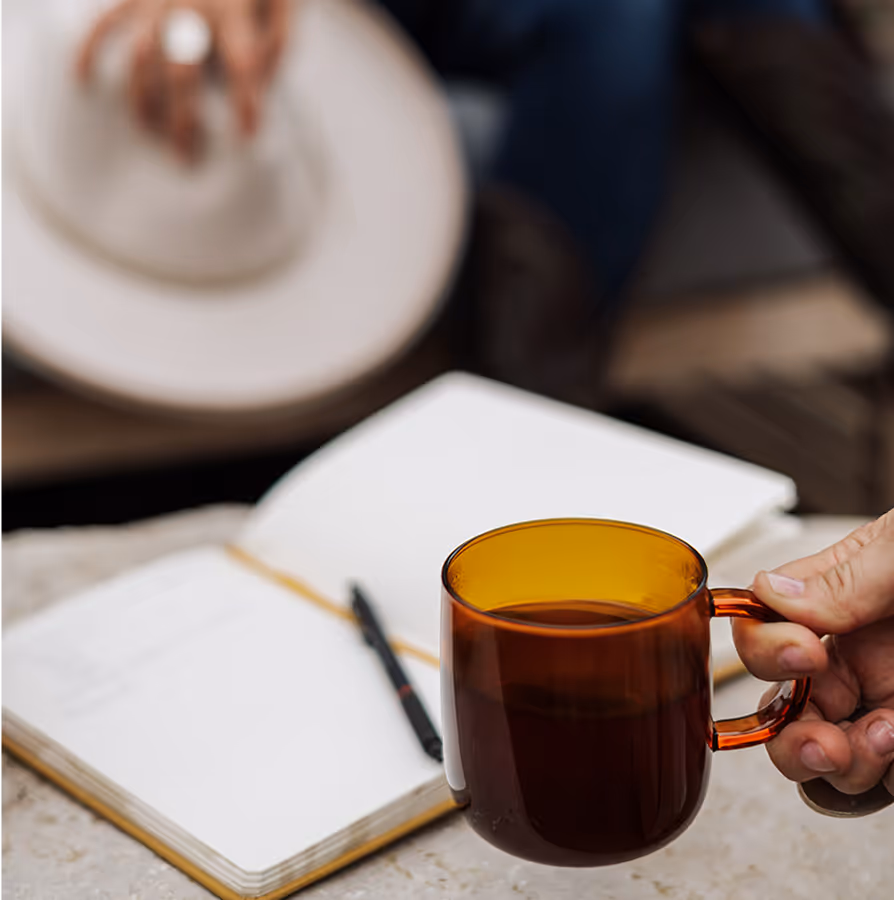 A partnership image with a coffee mug.