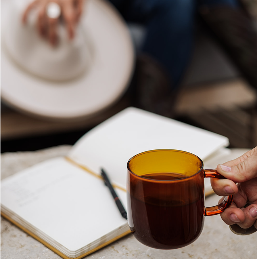 A partnership image with a coffee mug.