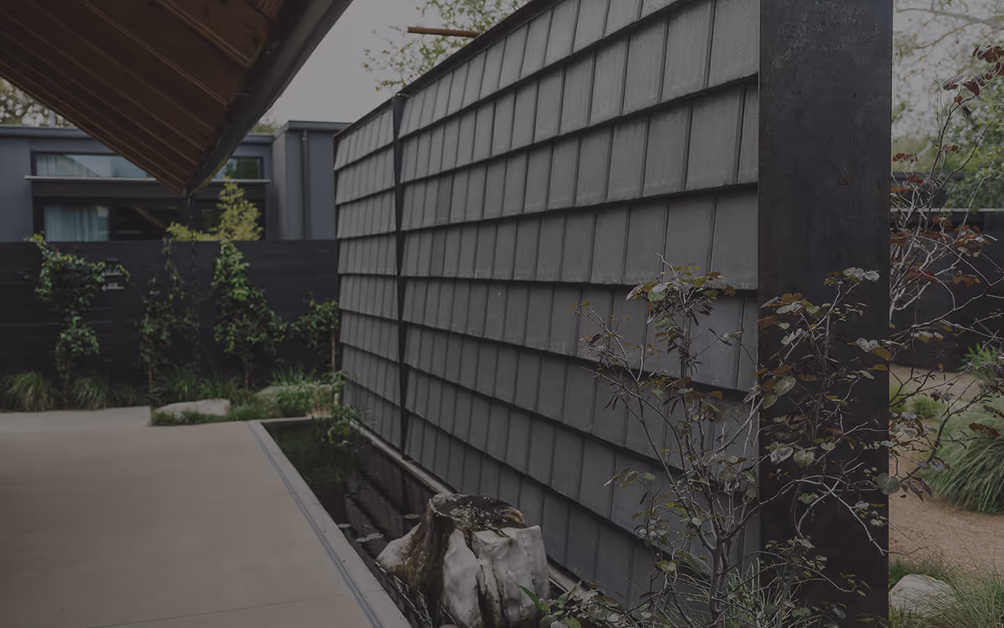 Beautiful stone wall with koi pond.