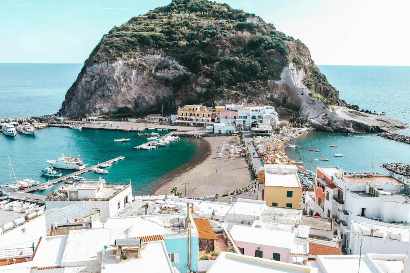 A luxury catamaran, sailing the stunning coast of Italy.