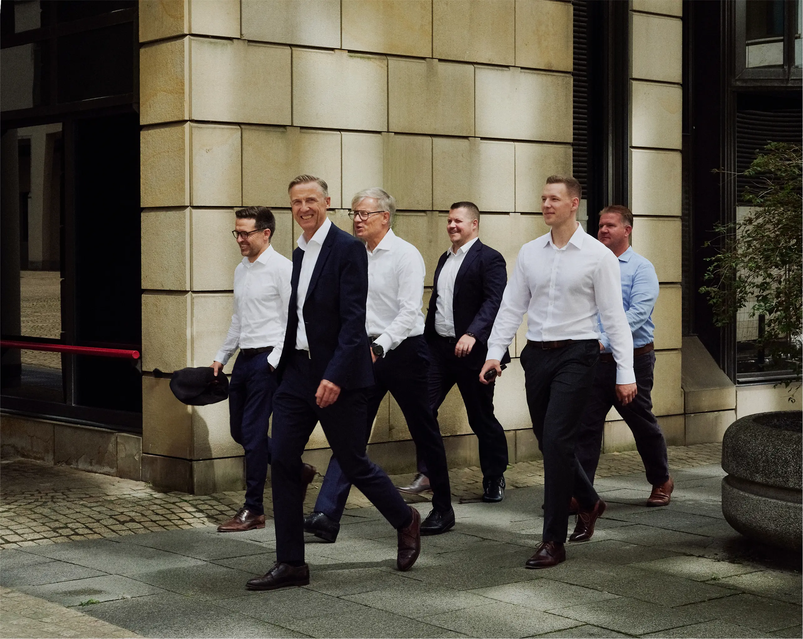 team image of etronixx employees and leaders in the streets of frankfurt