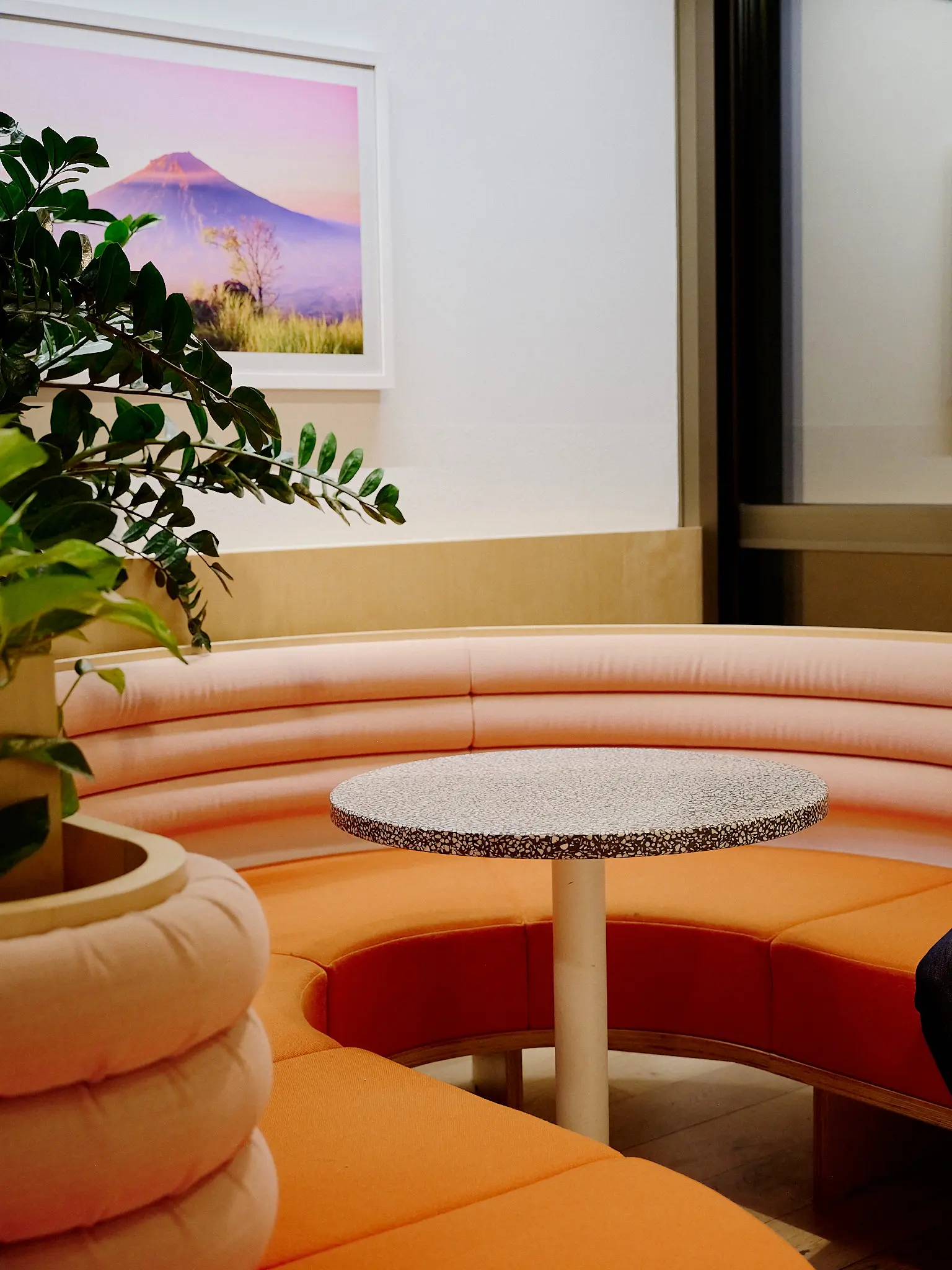 office detail with sitting booth of etronixx headquarters at wework