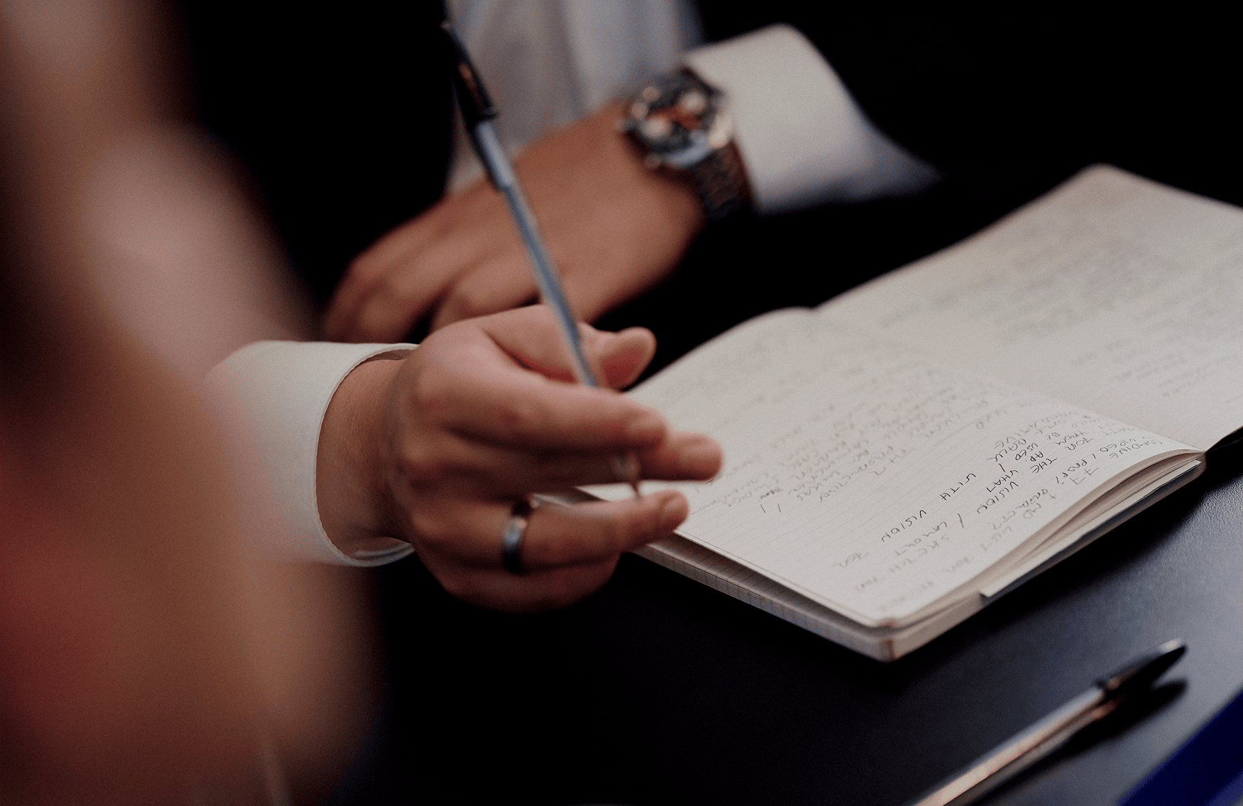 An image of a team or groups of people in discussion in a bright, open space , strategic change